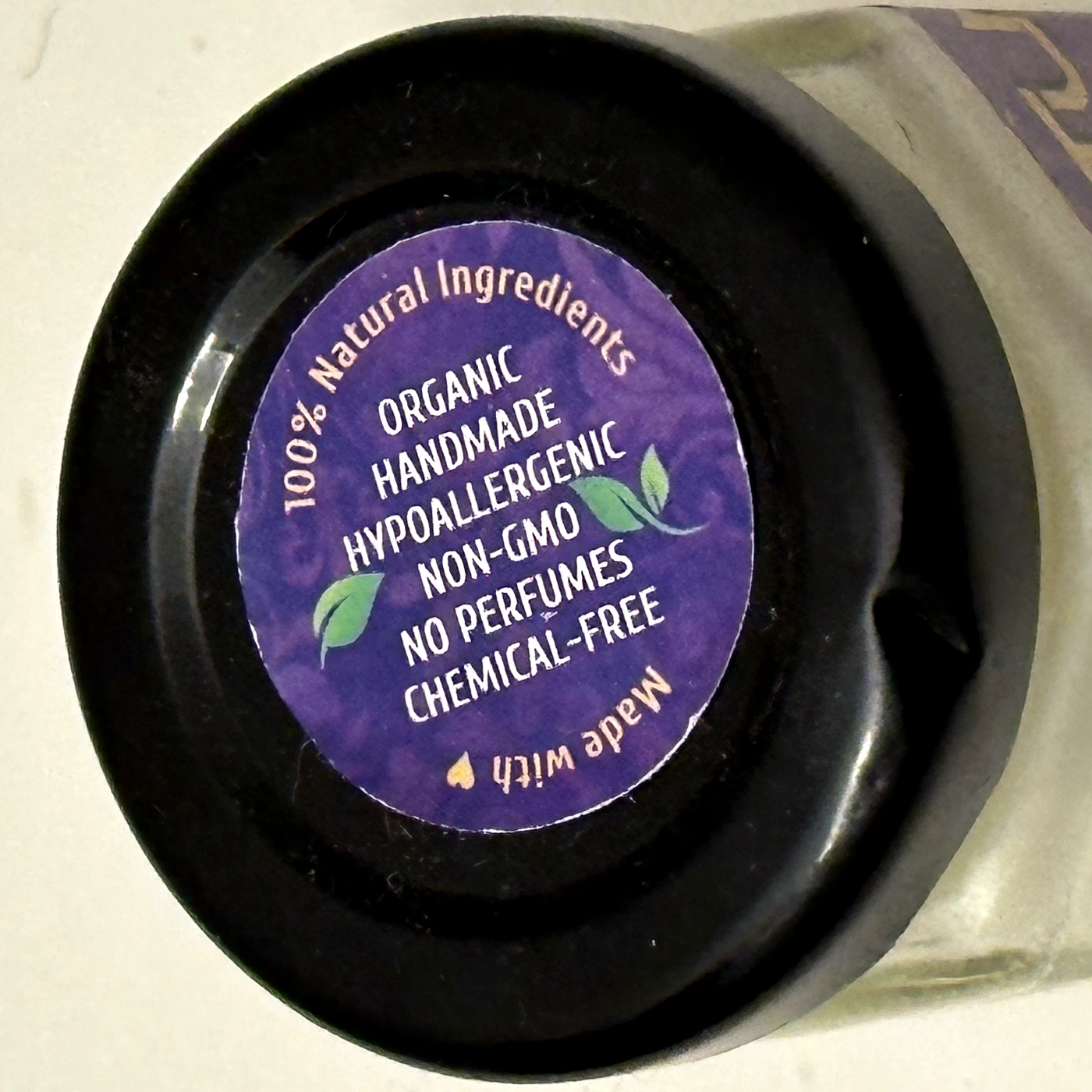 Close-up of the handmade natural balm lid seal